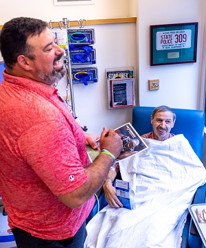 Joe Andruzzi visits Dartmouth Cancer Center patients