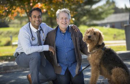Dr. Kapadia with Dick Poulin and his dog