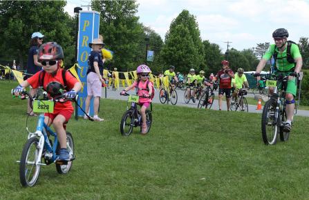 Kids riding bikes at the Prouty