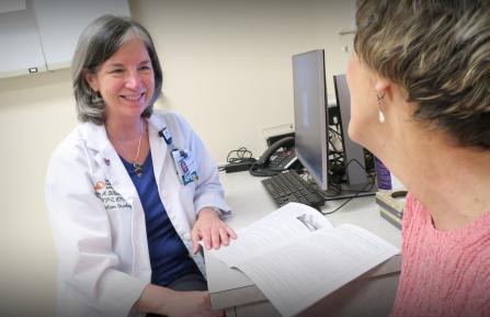 Susan DiStasio, APRN, with patient