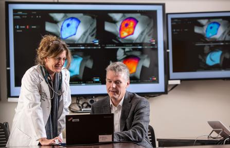 Lesley A. Jarvis, MD, PhD and Brian W. Pogue, PhD in imaging lab