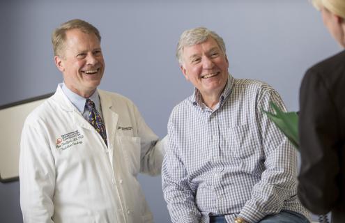 Radiation Oncologist, Alan Hartford, MD, with his patient, William Handy.