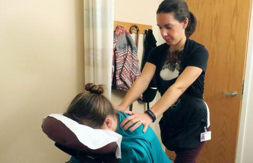 Patient receiving reiki massage