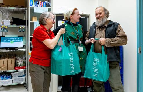 Phil Howard with food pantry staff and volunteers.